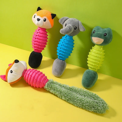 Colorful dog toys shaped like animals on a yellow and green background